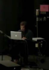 Israel Newman performing his piece Triggers on December 12, 2010